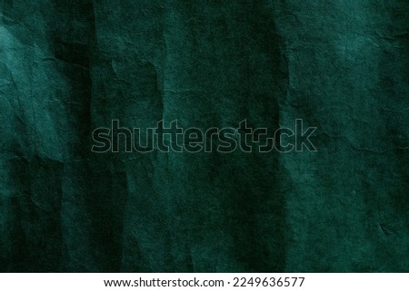 Dark green paper background surface texture