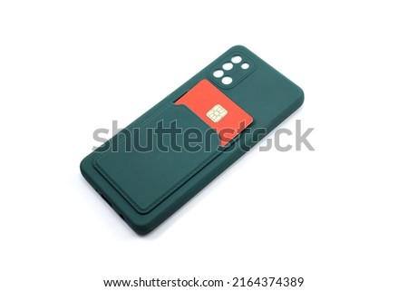 dark green phone case for smartphones with credit card storage isolated on white background.