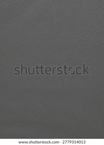 Dark grey artificial leather texture background