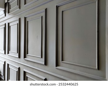 Dark grey square shape wainscoting.