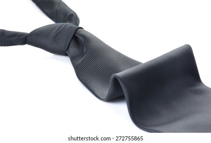 Dark grey tie on white background