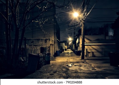 Dark, Gritty And Wet Chicago Alley At Night After Rain.