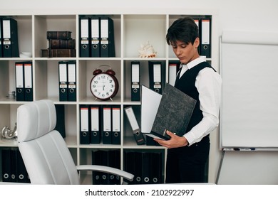 Dark Hair Handsome Young Boy In Business Suit And School Uniform Use The Phone And Books In The Office  