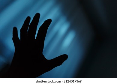 Dark Hand Shadow Reaching Into The Unknown