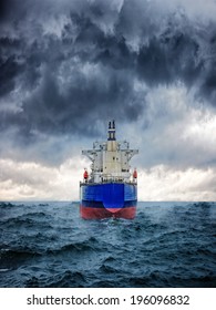 Dark Image Of Big Cargo Ship In Strong Storm.