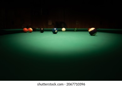 A Dark Image Of Billiard Balls On The Board