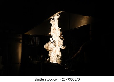 Flambé In The Dark Kitchen