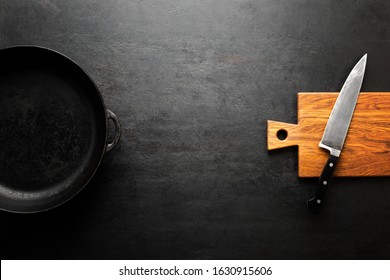 Dark Kitchen Background Or Concept With Blank Space For A Text, Top Down View