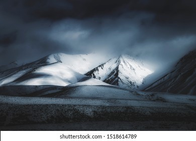 Dark Landscape Mountain Background, Spooky Darkness Winter Storm Weather, Scenic View of Mountains In The Distance, Foggy Misty Clouds Rolling Over Mountain Range