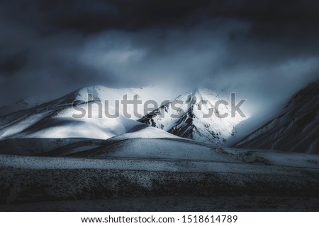 Dark Landscape Mountain Background, Spooky Darkness Winter Storm Weather, Scenic View of Mountains In The Distance, Foggy Misty Clouds Rolling Over Mountain Range