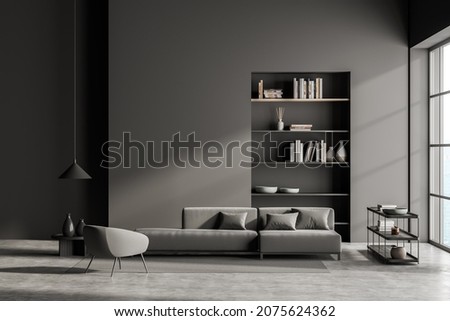 Dark living room interior with large sofa, armchair, panoramic window, bookshelves, carpet and concrete floor. Concept of minimalist design. Comfortable place for meeting. 3d rendering