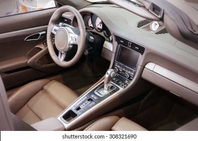Dark luxury car Interior - steering wheel, shift lever and dashboard - Shutterstock ID 308321690