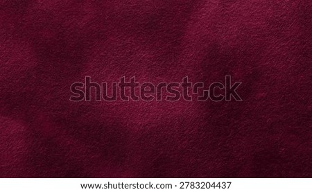 Dark Maroon Felt Texture Background with Moody Lighting