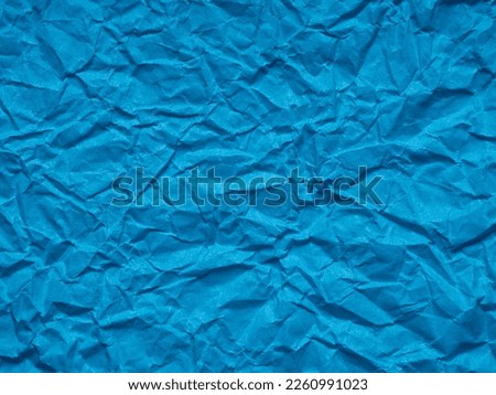 Dark matte blue crumpled paper texture. Blank page pattern for winter season Christmas festival card, new year designs decoration, background concepts, text, lettering, wall screen saver, 3d art work.
