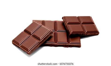 Dark milk chocolate bars stack isolated on a white background - Shutterstock ID 1076731076