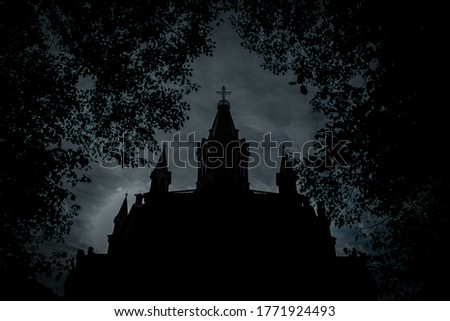 The dark and moody silhouette of St Pauli church in Malmö, Sweden