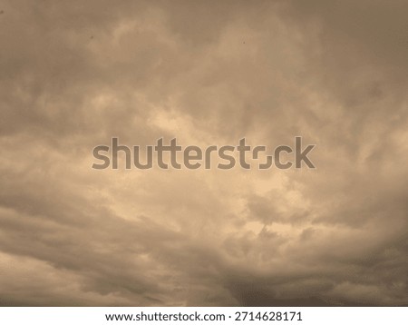 Dark, Moody Storm Clouds Texture with Vintage Sepia Tone