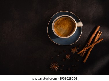 Dark And Moody Tone Of A Coffee Cup Anises And Cinnamon On Black Table. Concept Loft Coffee Shop. Morning Coffee. Top Ten Of People's Favourite Drinks. How To Make Coffee. Handmade Mug.