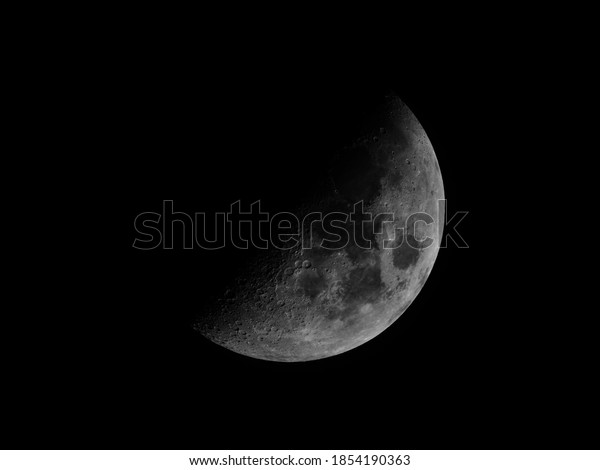 Dark moon,\
half moon, gibbous moon, black and\
white