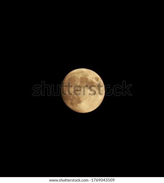 Dark moon in the sky. Full moon in the dark sky.
The big moon. Moon
eclipse.