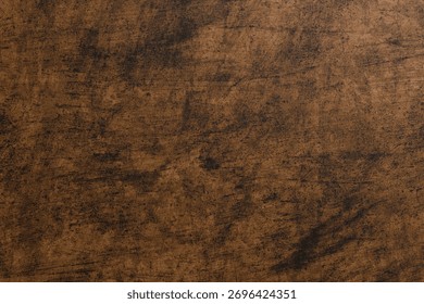 Dark, mottled brown background with subtle scratches and textures, resembling distressed wood or aged leather