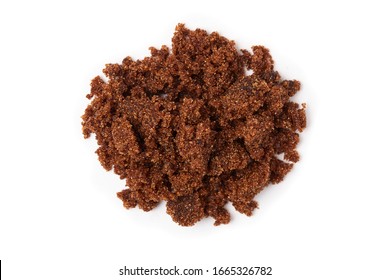 Dark muscovado sugar, also called Barbados sugar, khandsari, or khand, isolated on white background