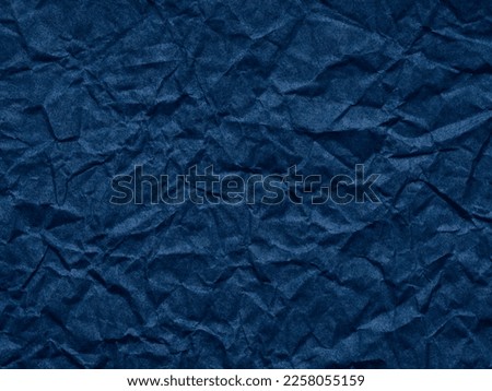 Dark navy blue crumpled paper texture. Blank page pattern for winter season Christmas festival card, new year designs decoration, background concepts, text, lettering, wall screen saver, 3d art work.