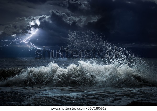 dark ocean\
storm with lgihting and waves at\
night