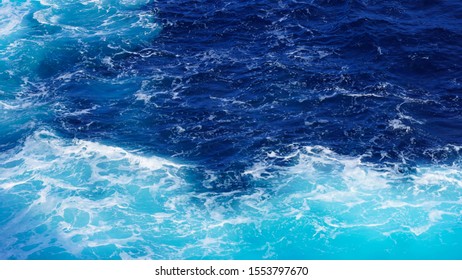 dark ocean water. drawing of sea water, the natural composition of ripples on the water. texture of foam in the water. wave splashing