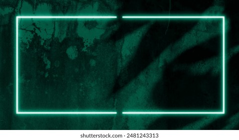 Dark old cement wall and shadow leaves background, green neon light and white rectangle frame and glowing - Powered by Shutterstock