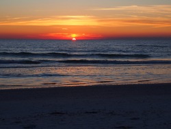 Dark Orange Sunset On The Gulf Of Mexico