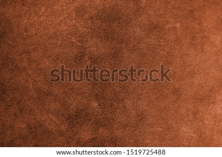 Dark orange,brown color leather skin natural with design lines pattern or red abstract background.can use wallpaper or backdrop luxury event.