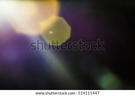 Dark overlay background of blue LED lights with bokeh effect. Includes copy space.