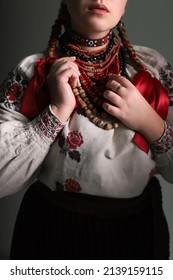 Dark Photo, Ukrainian Folklore Outfit, Caucasian Girl Is Standing Holding A Coral Necklace, History Of Ukraine, 20th Century