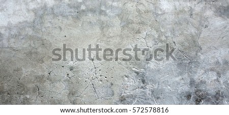 Dark Plaster Wall With Dirty White Black Scratched Horizontal Background. Old Brickwall With Peel Grey Stucco Texture. Retro Vintage Worn Wall Wallpaper. Decayed Cracked Rough Abstract Banner Surface.