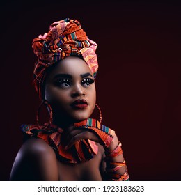 dark portrait of beautiful african woman in traditional nigerian costume