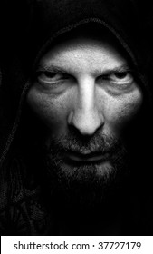 Dark Portrait Of Scary Evil Sinister Bearded Man