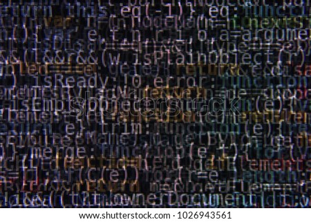 Dark Program Source Code Segments on Computer Screen Abstract Background