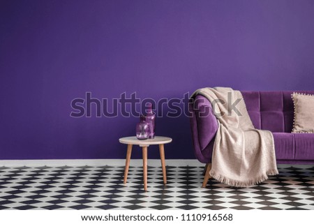 Similar – Violet wall with white drip marks