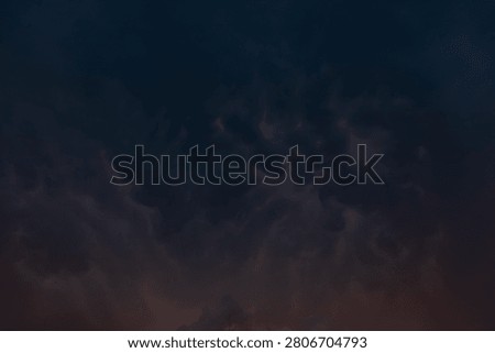 Dark, rain clouds on a summer evening, heralding a downpour.