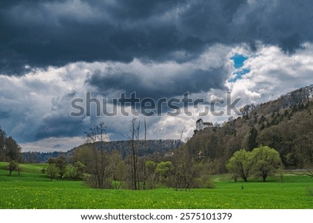 Dark rain clouds over the Trubach valley near Egloffstein in Franconian Switzerland