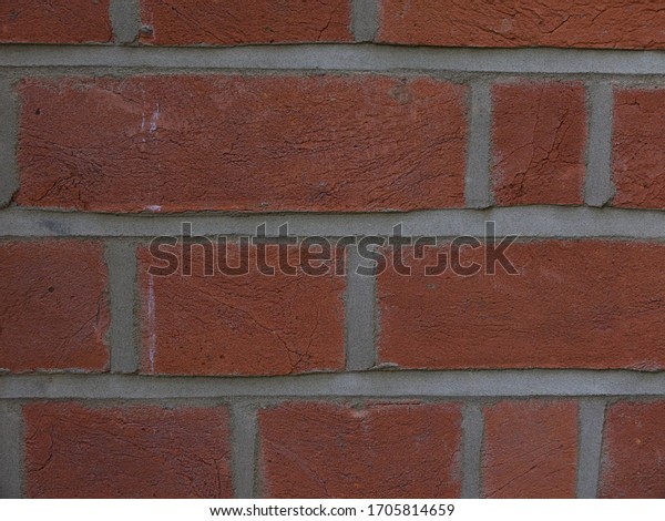 Dark red\
brick work background with room for\
text