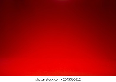 Dark red empty scene with beam of light on wall, gradient. Rich abstract stage for design, showing, presentation of produce.