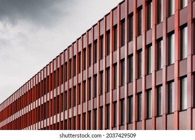 Dark Red Facade Cladding of a Modern Office Building in Sandnes, Norway. Patterned Repetition and Rhythm in Architecture.