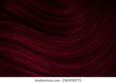 Dark red hair close-up as a background. Women's long brown hair. Beautifully styled wavy shiny curls. Coloring hair with bright shades. Hairdressing procedures, extension. - Shutterstock ID 2365930775