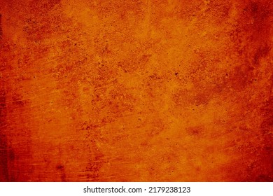  Dark red orange texture.Toned rough concrete wall surface. Close-up. Bright colorful background with space for design. Autumn, Halloween. Empty. Rusty color.                               Foto Stock