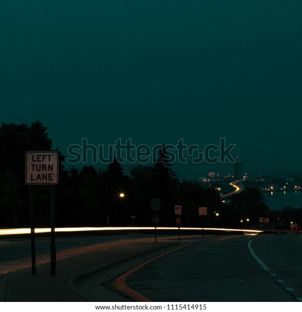 dark road light\
trails
