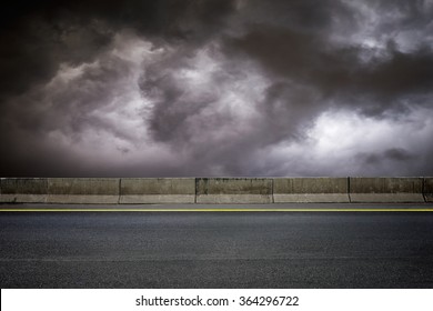 Dark Road And Dark Sky On Stormy Weather