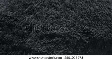 Dark rock surface with smooth shadow. High quality texture.
