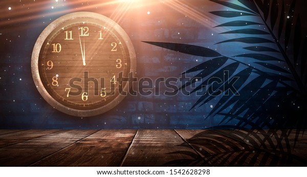 Dark\
room. Old brick wall. Clock on the brickwork, night view. Night\
scene with a clock on the wall. Festive\
background.